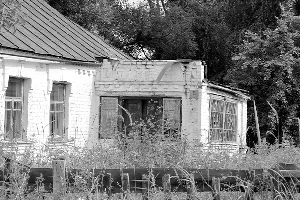 A picture of an old house, old homes may contain asbestos construction products